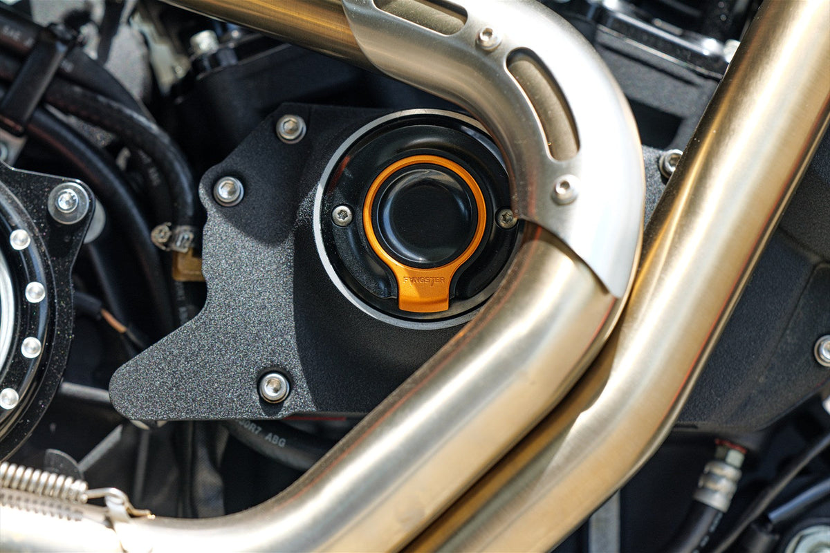 FANGSTER Color Collection Point Cover installed on a motorcycle - black and orange