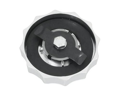 Neofactory 002695 chrome scalloped cam-type fuel cap, right, underside mounting interface